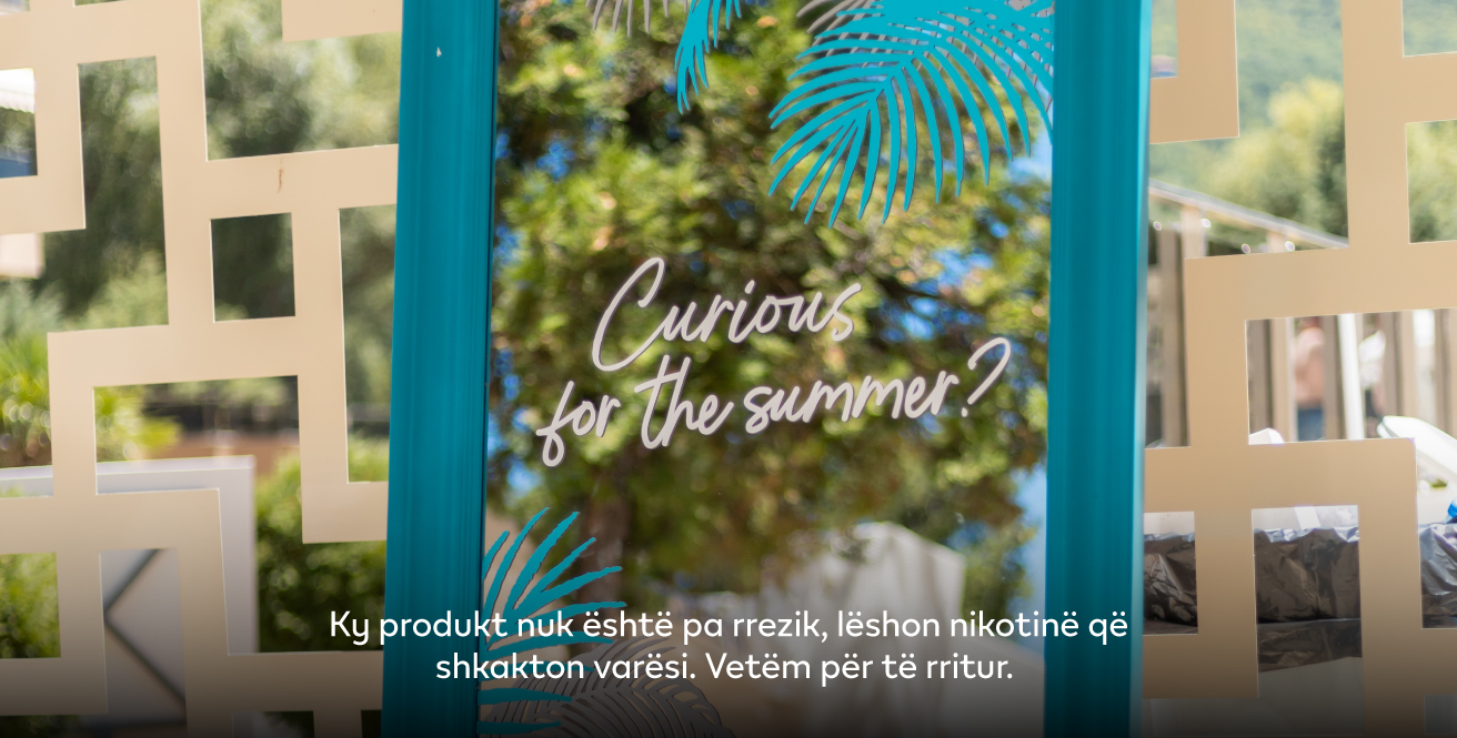 Pasqyra e IQOS me një tekst: Curious for the summer?