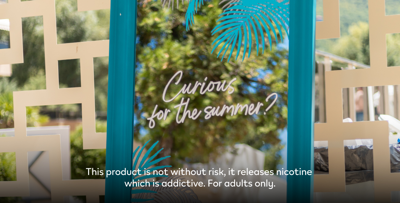 IQOS mirror with a text: Curious for the summer?